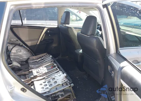 2016 Toyota Rav4 Hybrid Limited z USA, uszkodzony, nr VIN JTMDJREV2GD012869